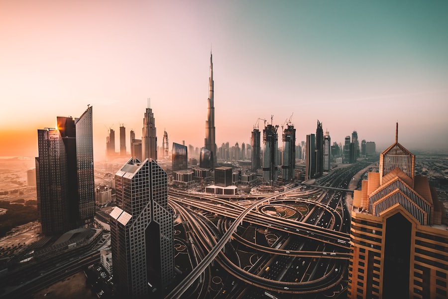 UAE skyline at sunset, with the Burj Khalifa rising over Dubai's downtown.